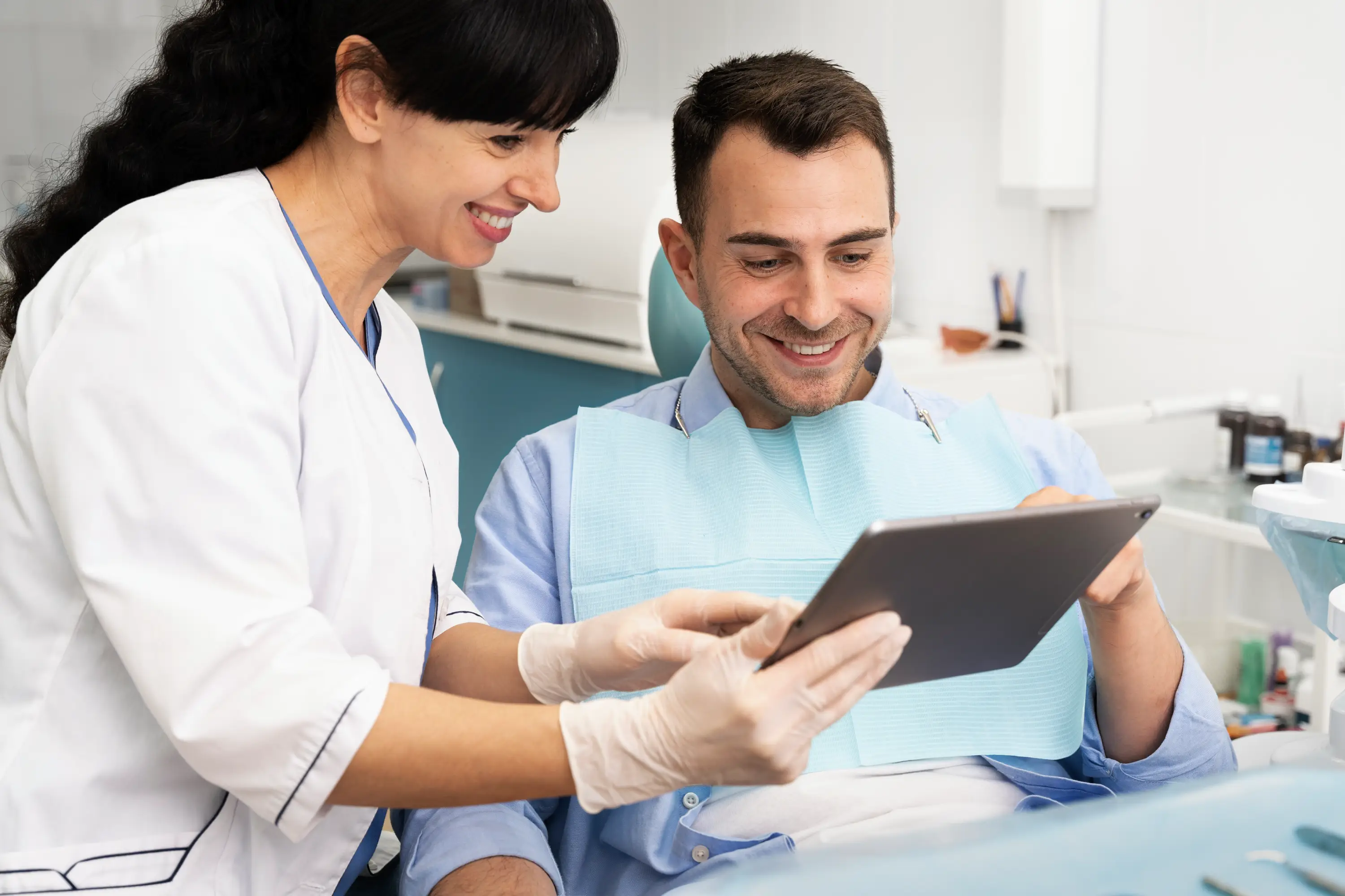 Dentist consulting with a patient